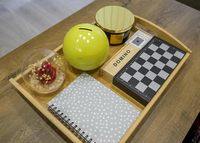 уютен в град *